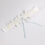 Thumbnail: Guipure flowers and tulle butterfly bridal garter with a central flower and a satin blue ribbon