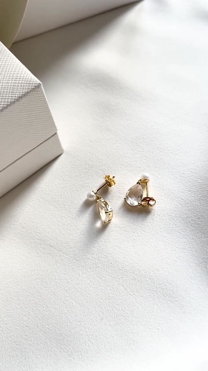 Thumbnail: Gold earrings with pearl stud and pear shape crystal dropper