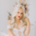 Bridal headpiece embellished with ivory clay flowers with ivory pearl centres and gold leaves