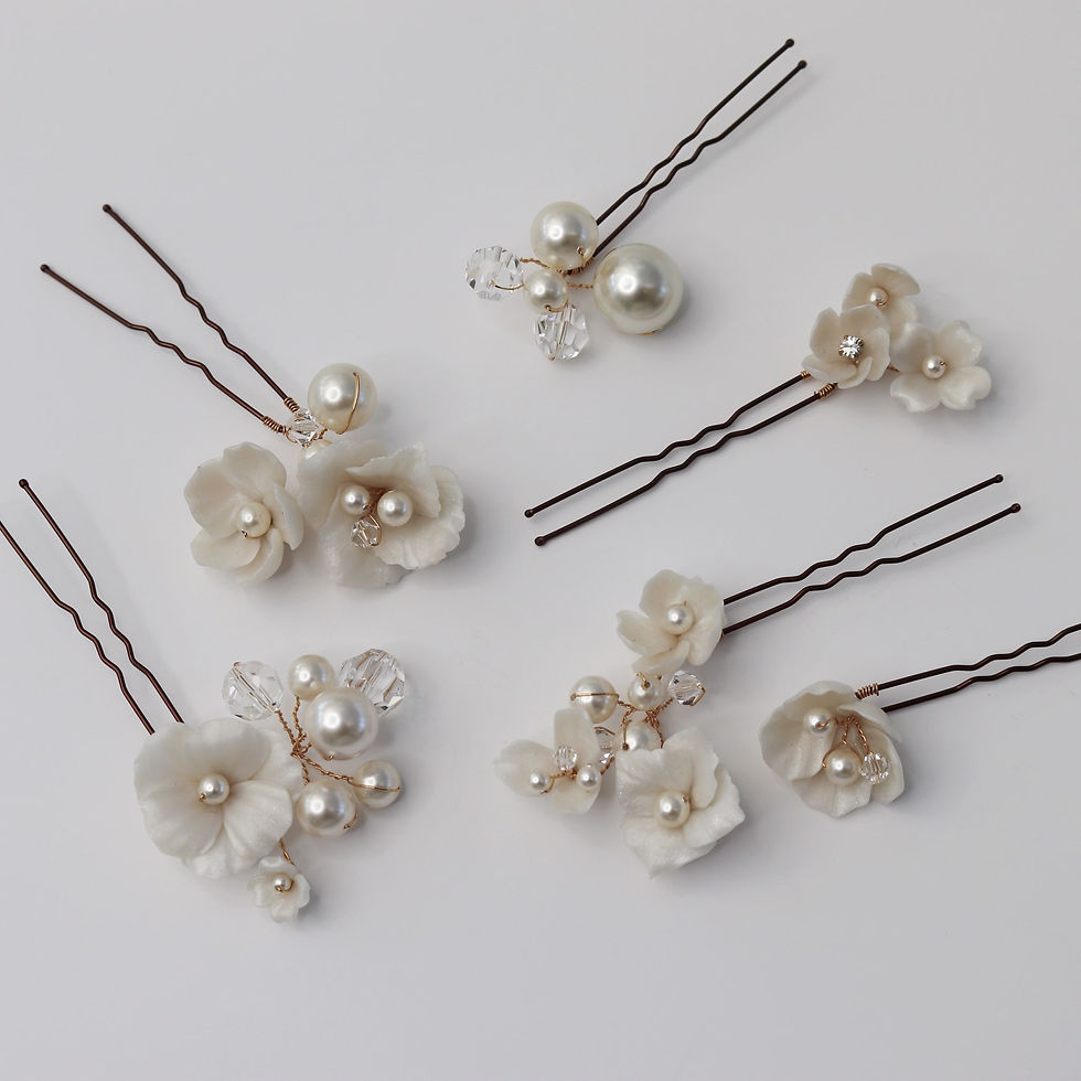 Thumbnail: Set of six bridal hair pins embellished with clusters of ivory clay flowers, ivory pearls and clear crystals