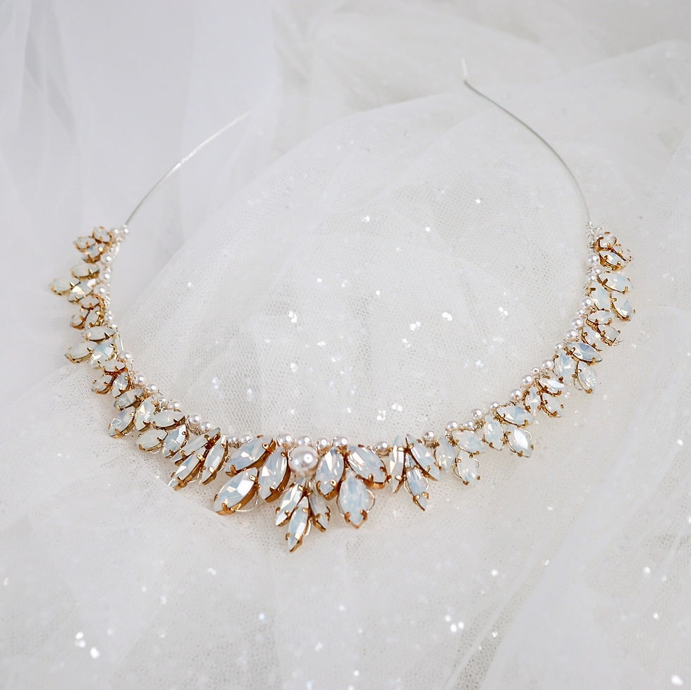 Gold wire bridal headpiece embellished with opal navettes and ivory pearls, modelled by bride