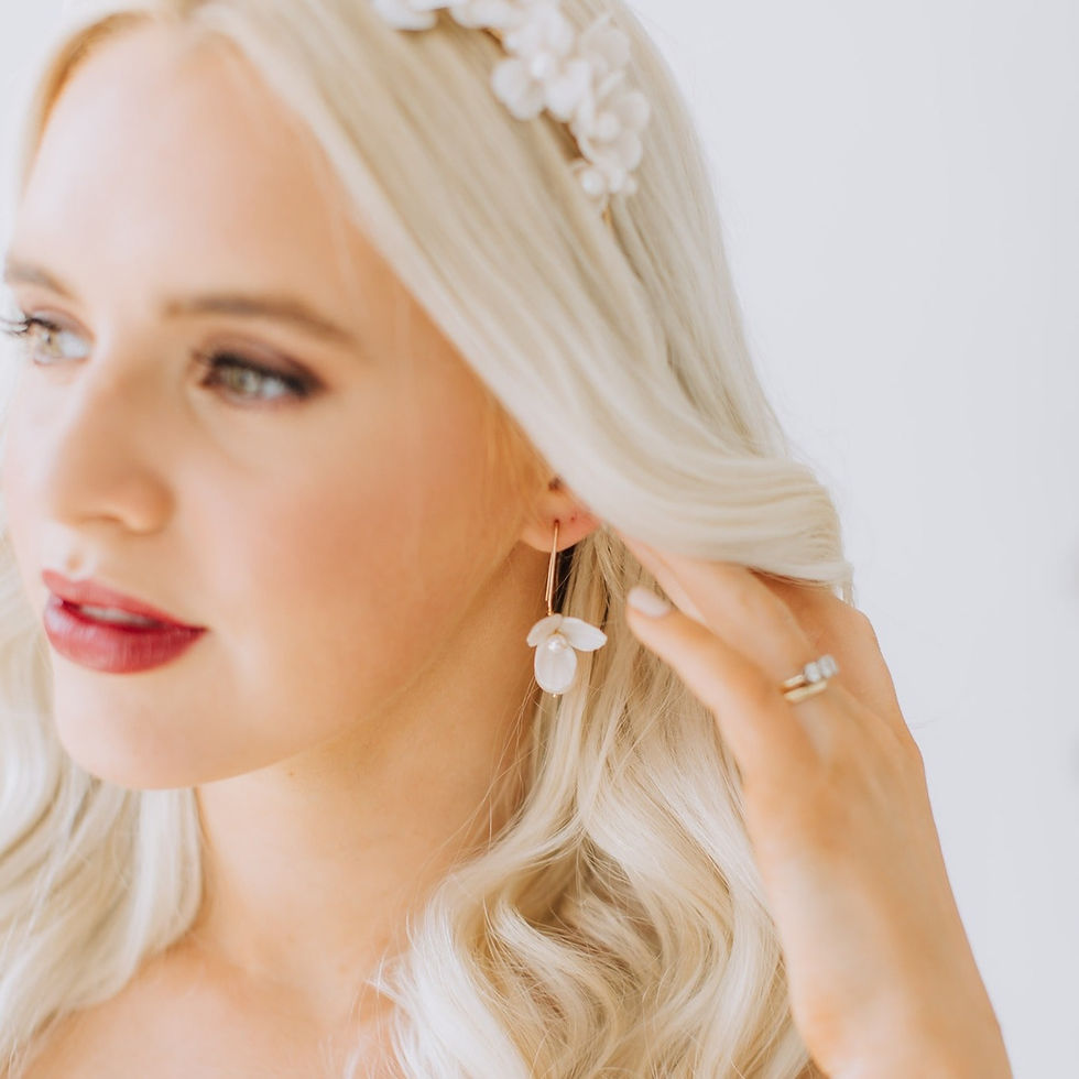 Thumbnail: Gold hook over earrings with ivory clay flower and pearl dropper.