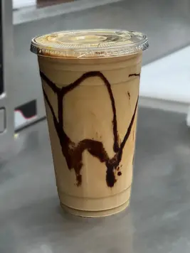 Iced coffee mocha style drink with drizzle