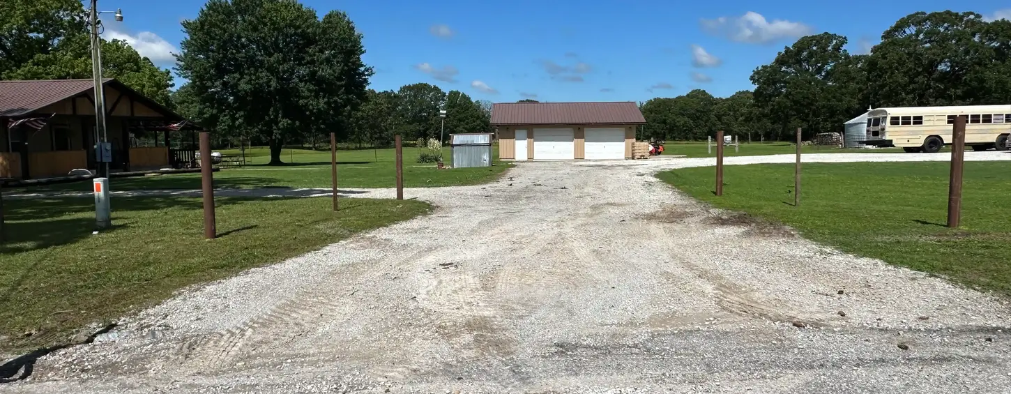 Gravel driveway washout and repair area near Joplin and Neosho Missouri.