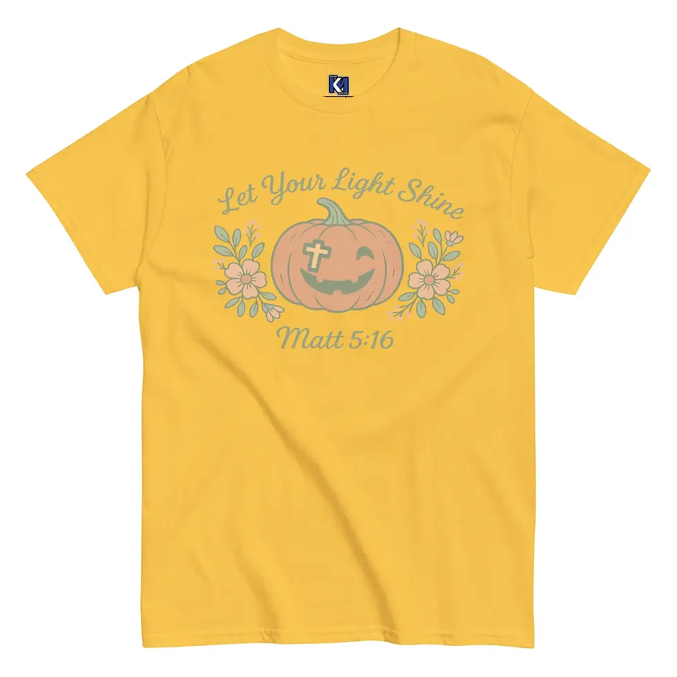 Thumbnail: Bright yellow daisy tee featuring pumpkin with cross, floral accents, and Matt. 5:16 text.