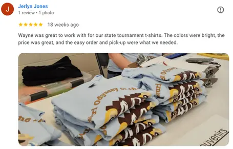 Image of stacks of tee shirt printed by K&M Kustom Kreations