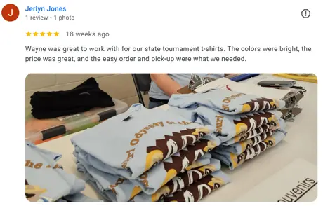 Image of stacks of tee shirt printed by K&M Kustom Kreations