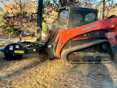 Skid steer working on a local property project near Joplin and Neosho Missouri