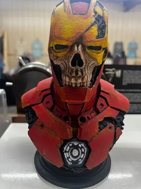 Front view of distressed skull armor 3D printed bust with battle worn paint detail.