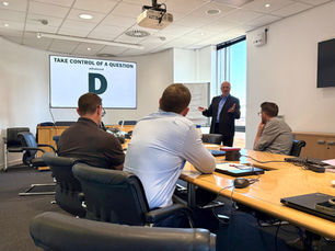 Empica Media training expert Darren Bane leads a session in an office