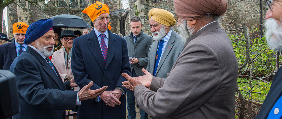 Duke of Kent meeting attendees at the opening of the garden