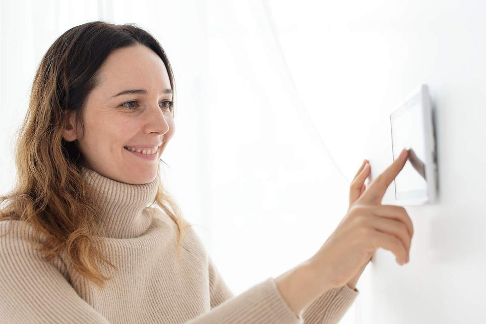 woman-pressing-smart-home-automation-panel-monitor