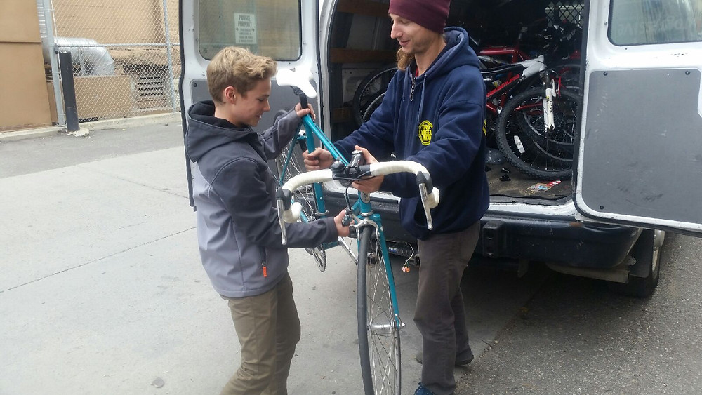 Unloading the van on Take Our Kids to Work Day