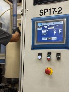 Technician operating machine