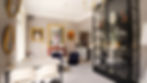 Espace lounge de l’Hôtel Brittany La Baule avec table, fauteuils et décoration élégante près de la réception