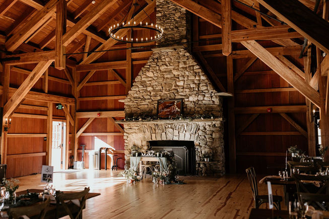 Historic stone fireplace at Sylvan Ridge Farm, a barn wedding venue where NJ, NY, and PA meet