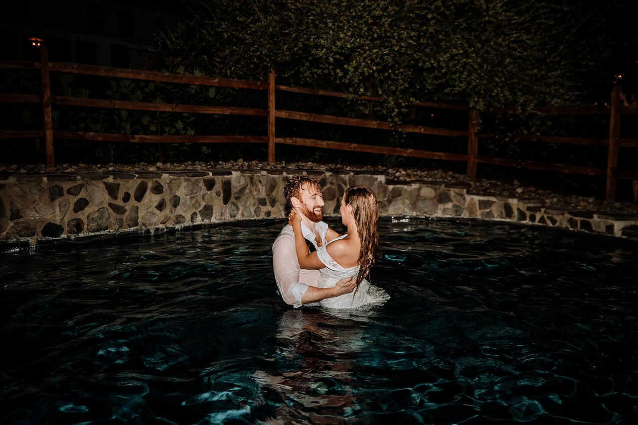 Bride & groom in the pool during a wedding afterparty at Sylvan Ridge Farm, an outdoor wedding venue in Pennsylvania