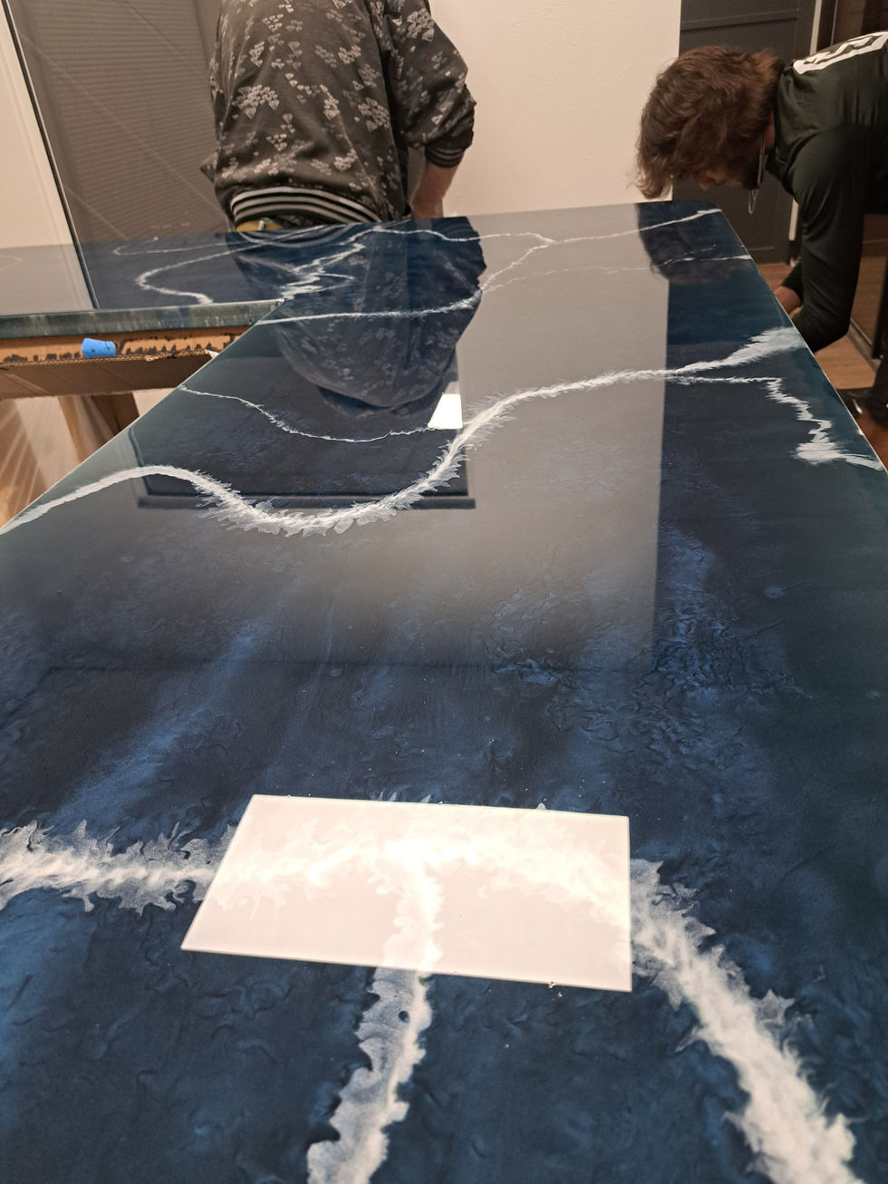 Captivating Metallic Epoxy Countertop Front Desk at B3 Construction Office, Central Florida. Elevate your workspace aesthetic