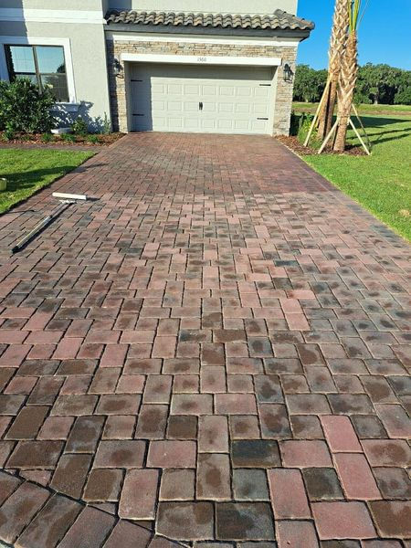 "Enhanced durability: Stone sealing project successfully completed on driveway surface."