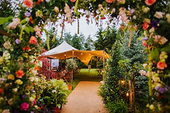 Stretch Tent viewed through floral arch