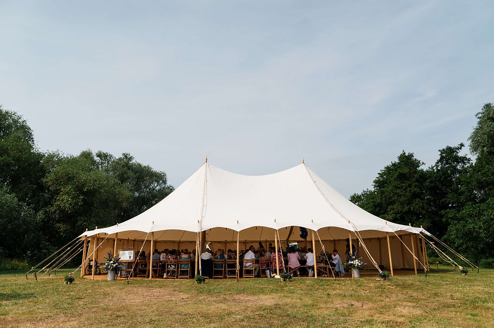 A Pole Marquee with open side pitched at The Lakeside Wedding Venue Bedfordshire