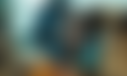 A young African woman stands in a rural setting overlapped with digital graphics 