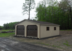 24x26 Wood Modular tan paint, light brown trim, hickory shingles, 7_4 walls 9x7_6 OH 3 pit