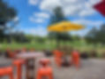 outdoor dining tables with umbrellas