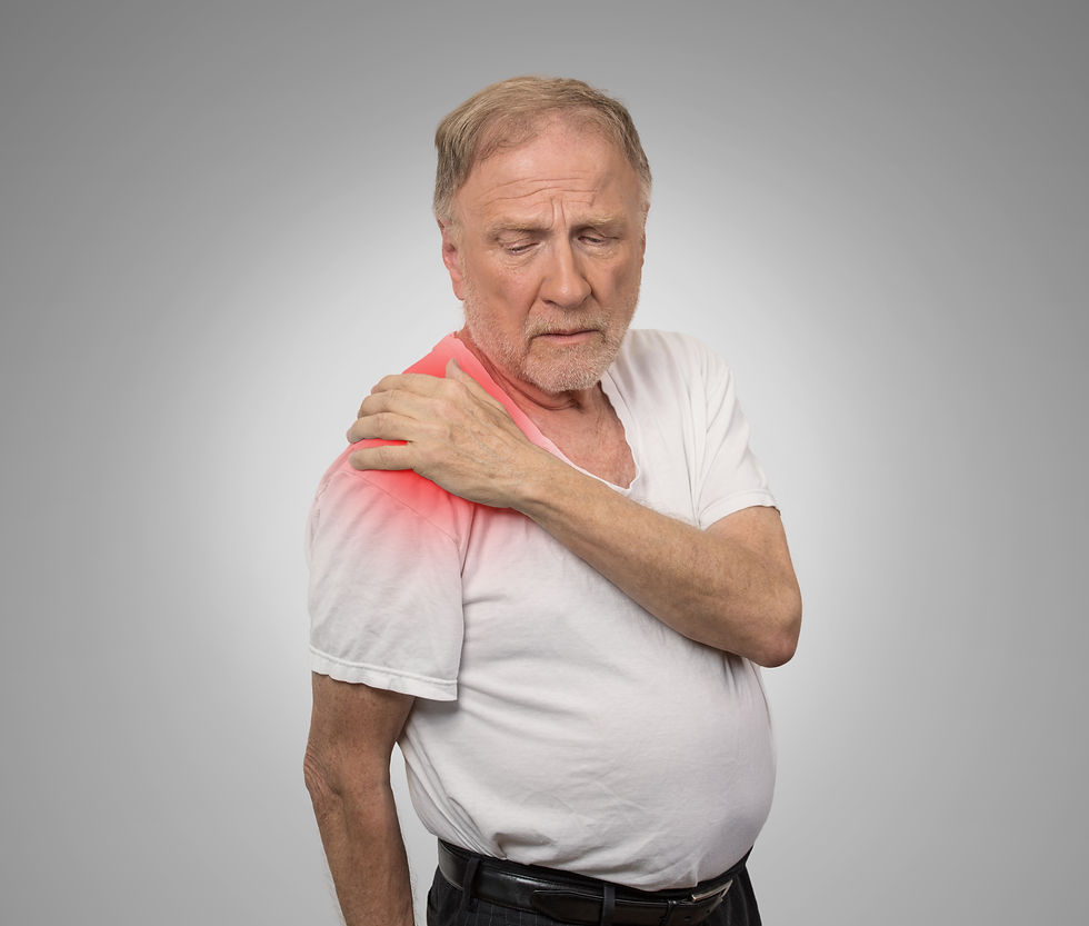 man-with-shoulder-pain-wearing-white-t-shirt-2026-04-13-23-26-55-utc.jpg