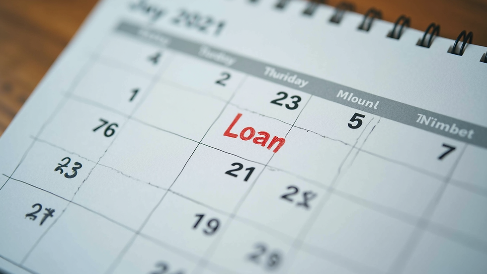 High angle view of a calendar with loan repayment dates marked