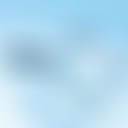 A magnifying glass held up to examine something closely, symbolizing the deep-dive process of psychological assessment for achieving diagnostic clarity.