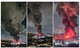 Combate a incêndio de grandes proporções em Guarulhos - SP teve apoio de 38 bombeiros, 14 viaturas, uma retroescavadeira e já dura mais de 20 horas, Fogo atingiu empresa de logística com materiais