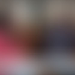 a reporter and a tour guide sit on a bench