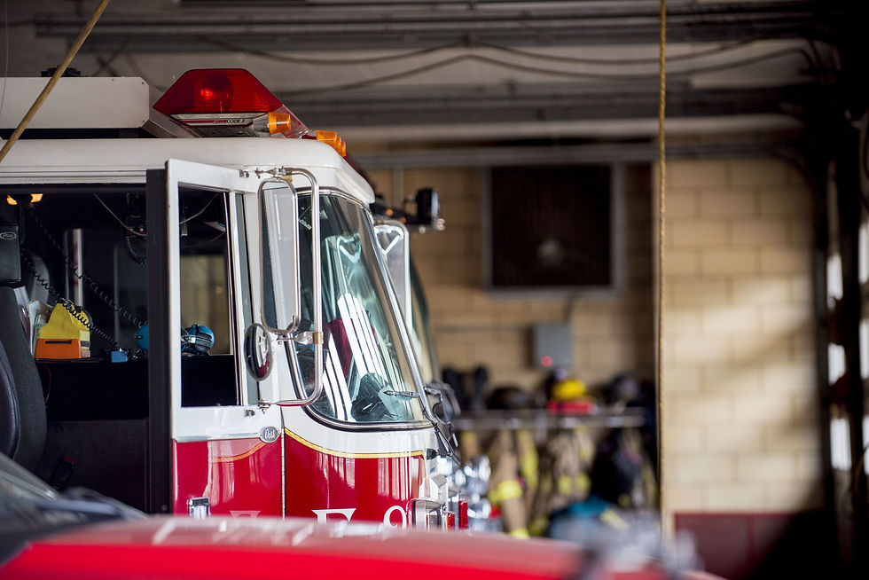 Closeup shot of a firetruck with an open door.