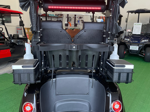 Dual coolers, golf club cover, lighted license plate holder, high speed rear end.