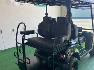 Full read seat with safety bar, seat belts, arm rest with cup holder, fold down seat to utility bed, lighted license plate holder, high speed rear end.
