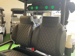 Diamond stitched high-back bolster seats, 26" Sound Extreme sound bar, Eco Lithium battery with 8-year warranty.