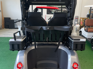 Dual coolers, golf club cover, lighted license plate holder, high speed rear end.