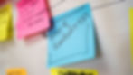 Sticky notes demonstrating Future Finance's missions including 'More Ambition'