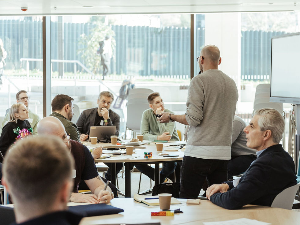A meeting between finance professionals discussing tech and innovation in the UK