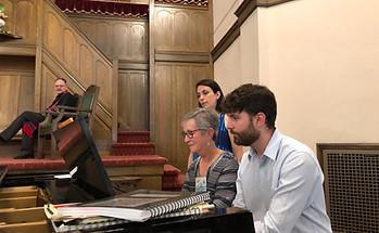 Witness the beauty of community music-making with a group playing piano in the First Universalist Church of Rochester.