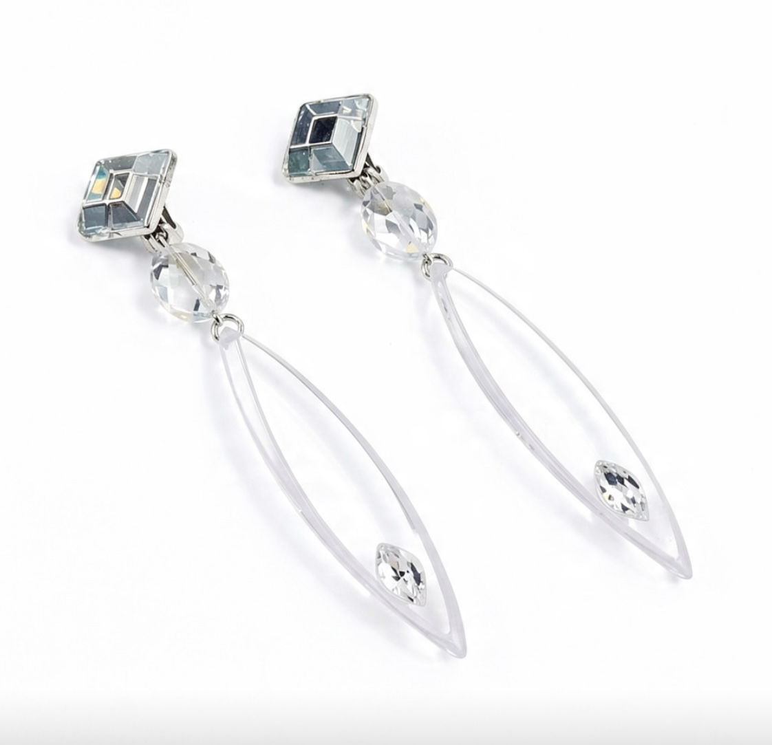 Francine Bramli boucles d’oreilles clips modèle plume Crystal transparent 