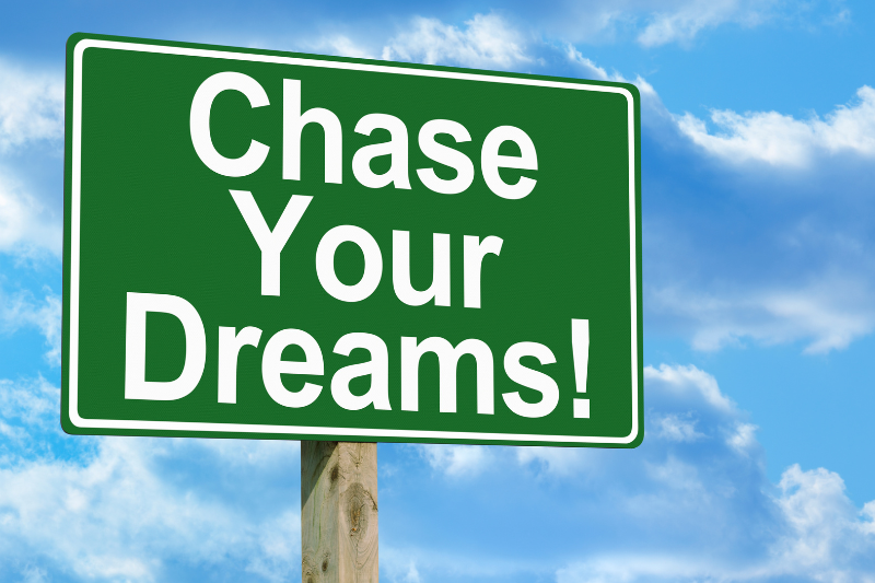 Sign that says chase your dreams.