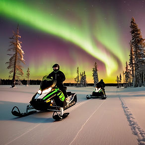 Snowmobiling under aurora borealis in lapland .jpg