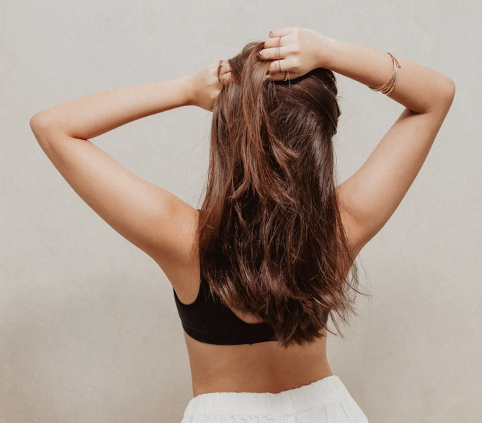 Women playing with her hair. 