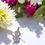 Miniatura: Brinco ponteira cravejada luz