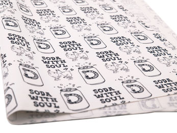 Custom printed tissue paper with branded logo in a luxury gift box