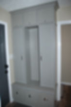Luxury laundry room remodel with locker style cabinets