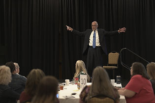 Ron Cox engages with Ohio conference attendees.