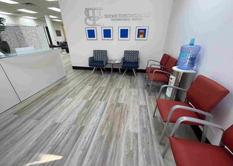 BE-orange-and-blue-lobby-seating-1-scaled-e1704728976270-768x548.jpg